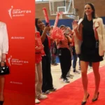 caitlin clark standing tall